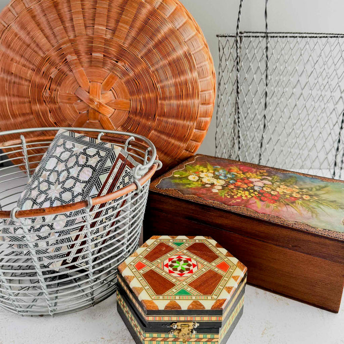 Collection of wire and wicker baskets and wood and inlaid boxes