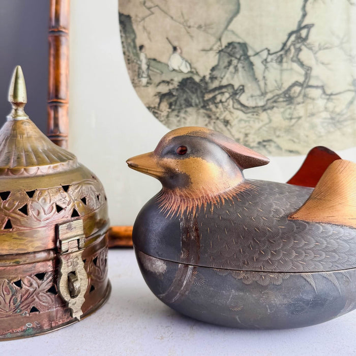 Brass cricket box, Japanese mandarin duck incense box, and faux bamboo framed Chinese print