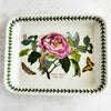 Front view of Portmeirion baking dish showing pink peony decoration and vine border