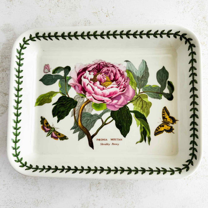 Front view of Portmeirion baking dish showing pink peony decoration and vine border