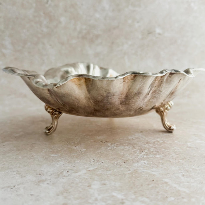 Side profile of silver ruffled bowl