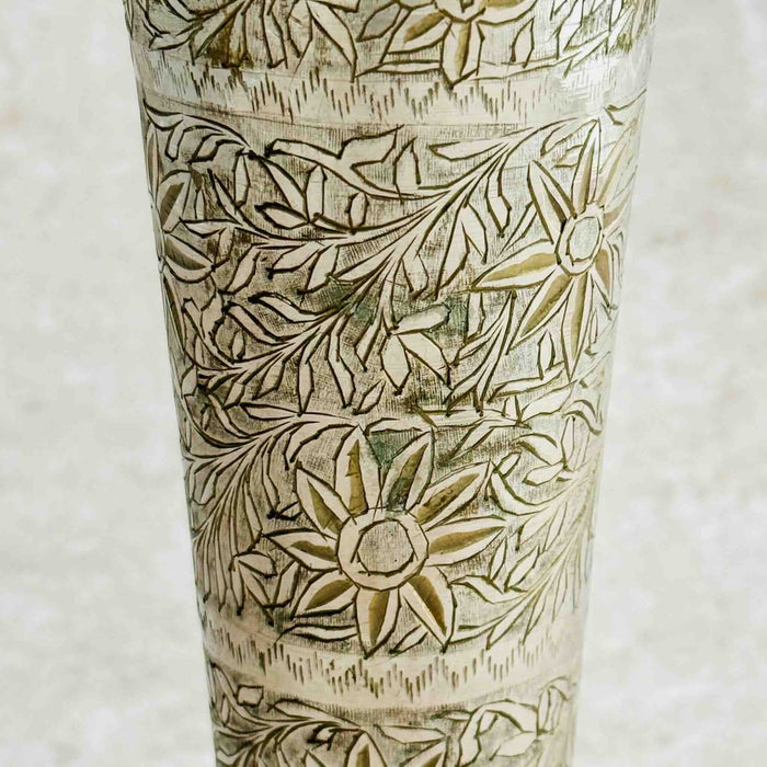 Close-up of the middle section of the engraved bud vase