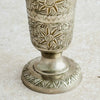 Close-up of footed base of engraved bud vase