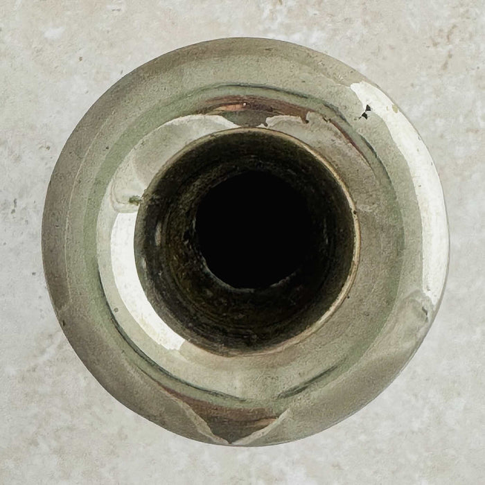 Close-up top down view of engraved bud vase
