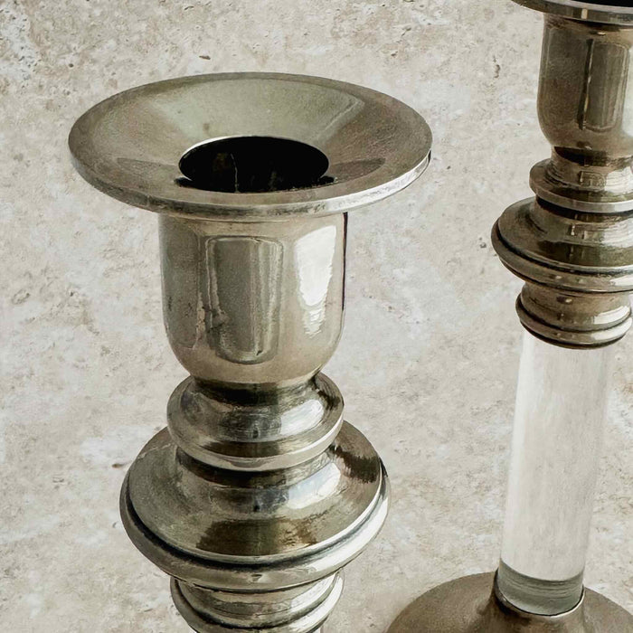 Close-up of top of silver lucite candle holder