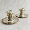 Staggered view of Art Deco candle holders
