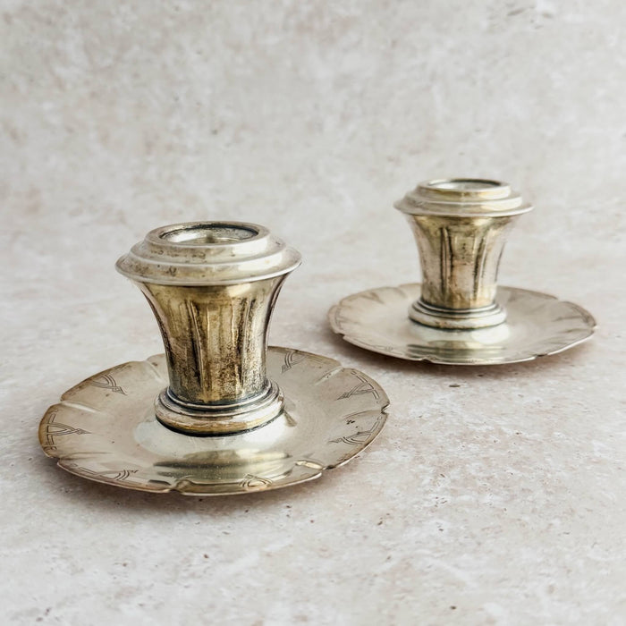 Staggered view of Art Deco candle holders