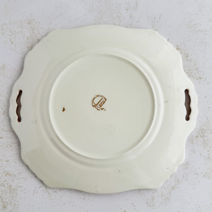 Back of cake plate showing maker's mark