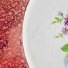 Close-up of cake plate floral decoration and crazing