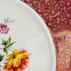 Close-up of cake plate floral decoration and crazing