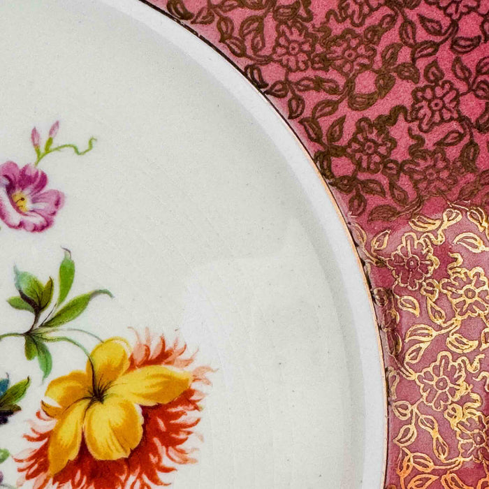 Close-up of cake plate floral decoration and crazing