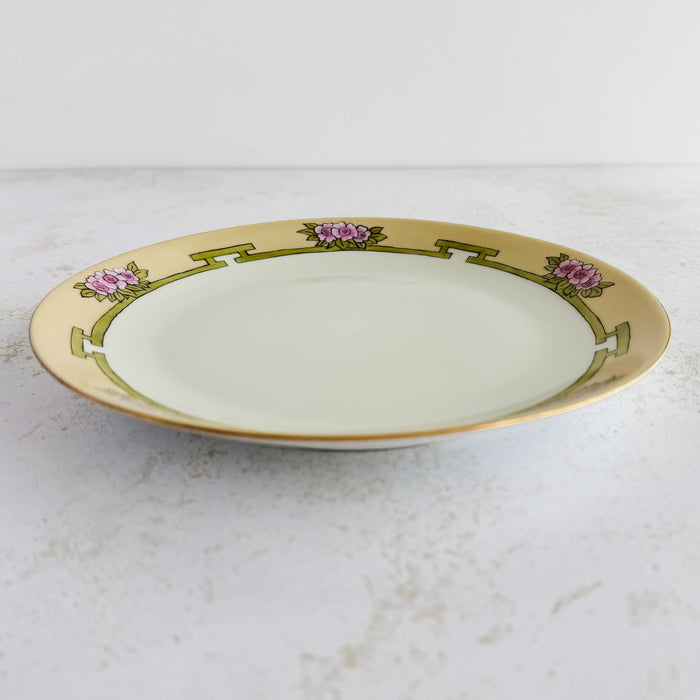 Side profile of hand-painted antique plate