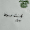 Close-up of handwritten dated artist signature 