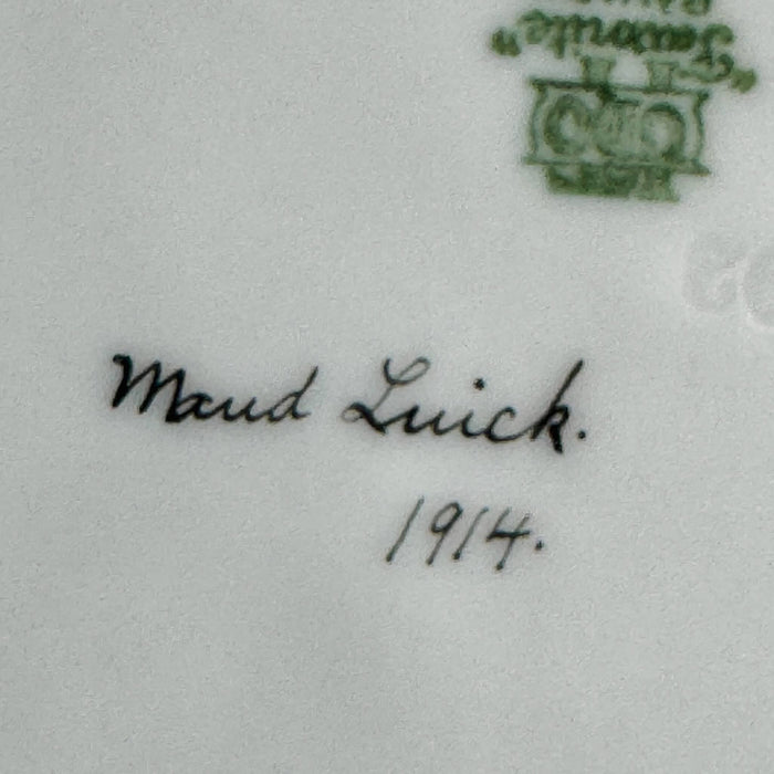 Close-up of handwritten dated artist signature 
