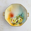 Front view of Meito China hand-painted handled dish