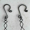 Close-up of hanging wire basket hooks