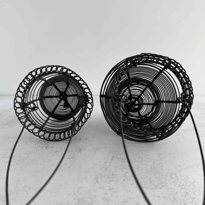 View of insides of hanging wire baskets