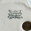 Closeup of makers mark of vintage Art Deco candle holders