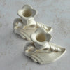 Angled top down view of Art Deco candle holders showing candle sockets and bobeches