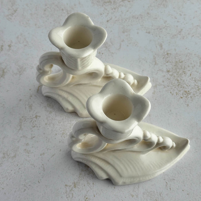 Angled top down view of Art Deco candle holders showing candle sockets and bobeches