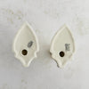 View of undersides of Art Deco candle holders