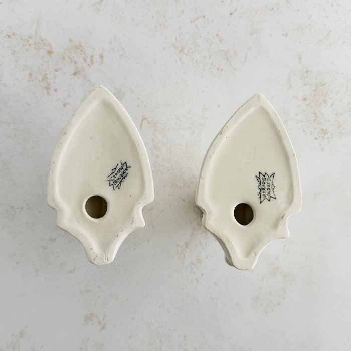 View of undersides of Art Deco candle holders