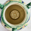 Closeup view of the inside of the Maruhon majolica vase