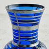 Close-up of silver overlay bands on neck of vase