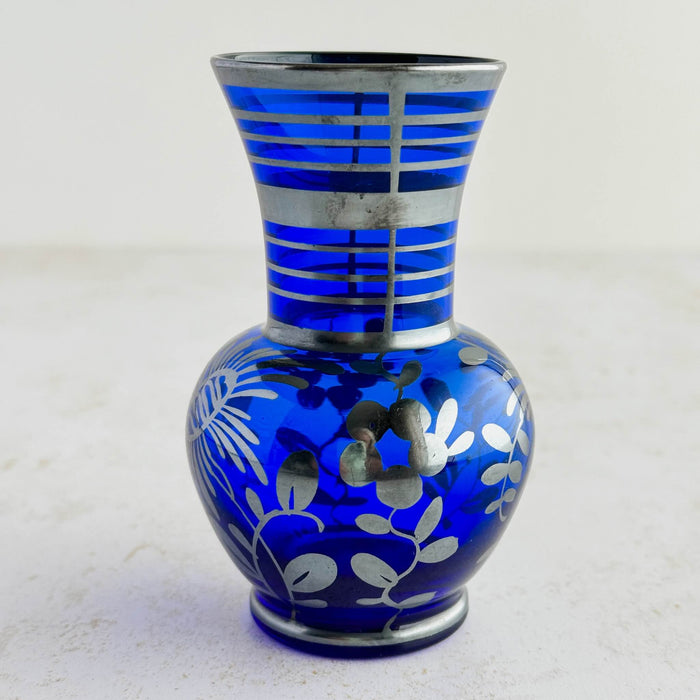 Cobalt blue vase showing shape and silver overlay