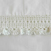 Close-up of pillowcase crochet lace edging