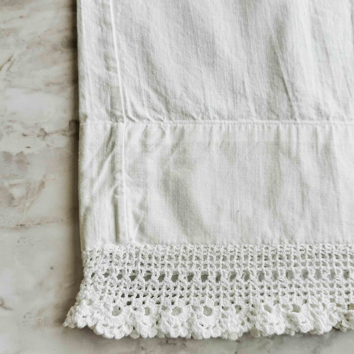 Close-up of out-of-square pillowcase seam