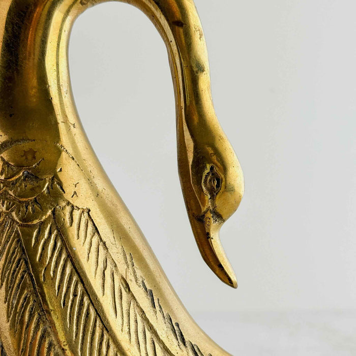 Close-up of patina on head, neck and feathers of swan bookend
