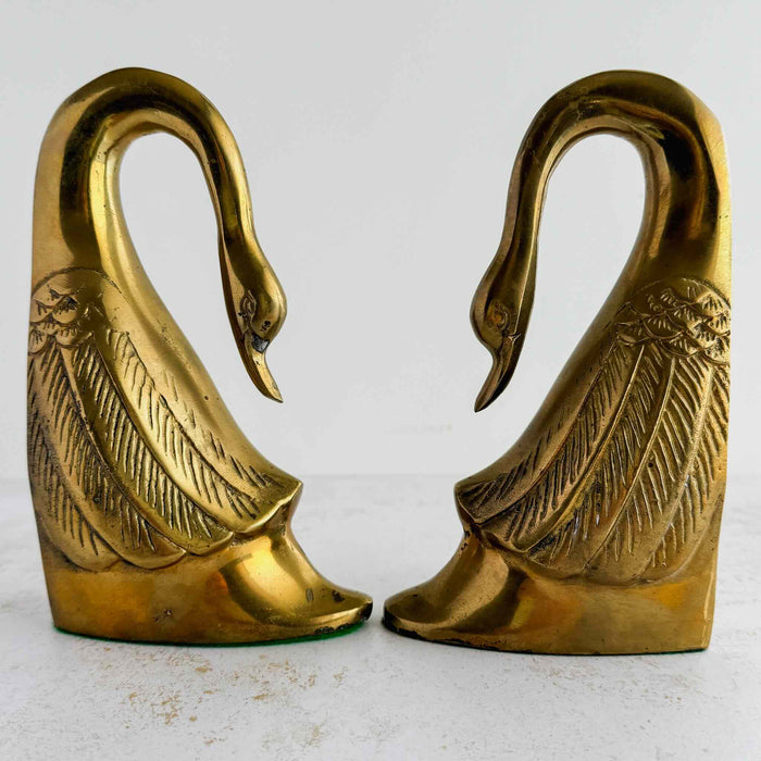Swan bookends with swans facing each other