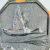 Close-up of duck in flight relief on bookend