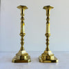 Pair of tall mid-century brass candle holders