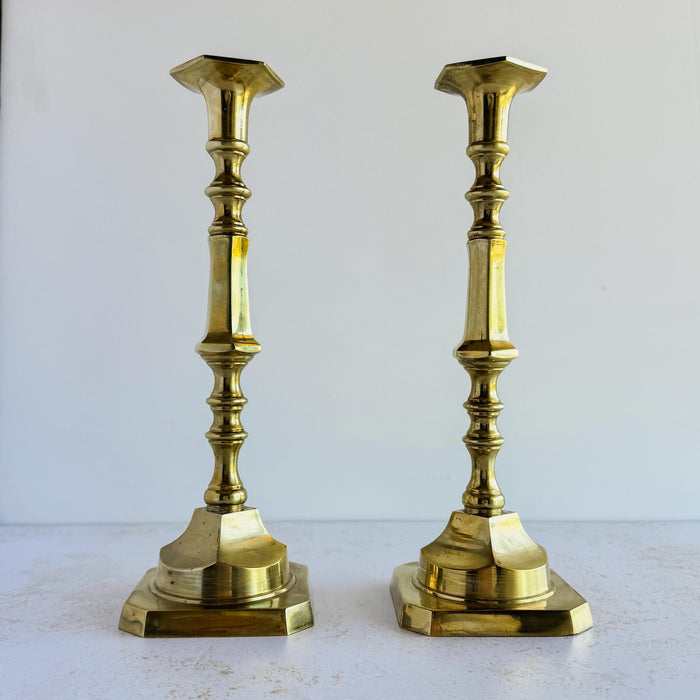 Pair of tall mid-century brass candle holders