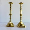 Pair of tall mid-century brass candle holders