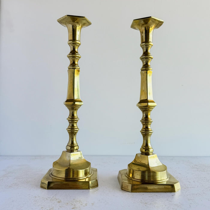 Pair of tall mid-century brass candle holders