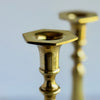 Close-up of patiina on top of candle holder with mate blurred in background
