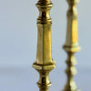 Close-up of patiina on candle holder stem with mate blurred in background