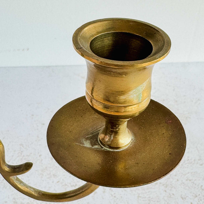 Close-up of patina on right cup and bobeche of candelabra
