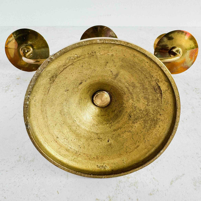 Closeup of underside of base of candelabra