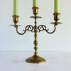 Vntage mid-century 3-candle brass candelabra styled with light green tapers