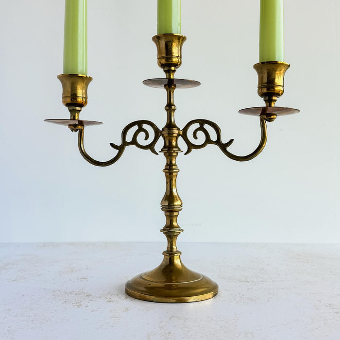 Vntage mid-century 3-candle brass candelabra styled with light green tapers