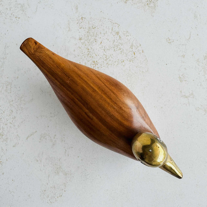 Wood and brass duck - top-down view