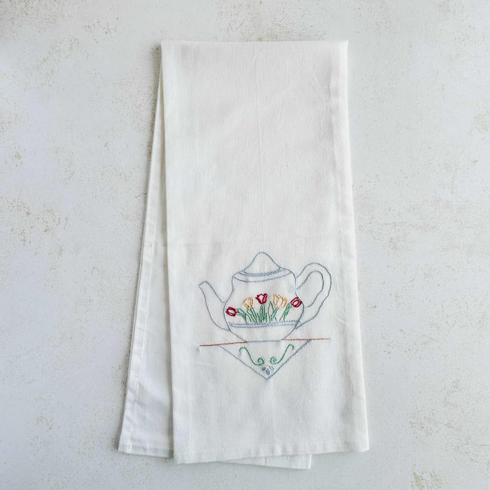 Blue teapot tea towel folded for hanging