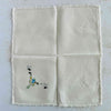 Back of unfolded cocktail napkin