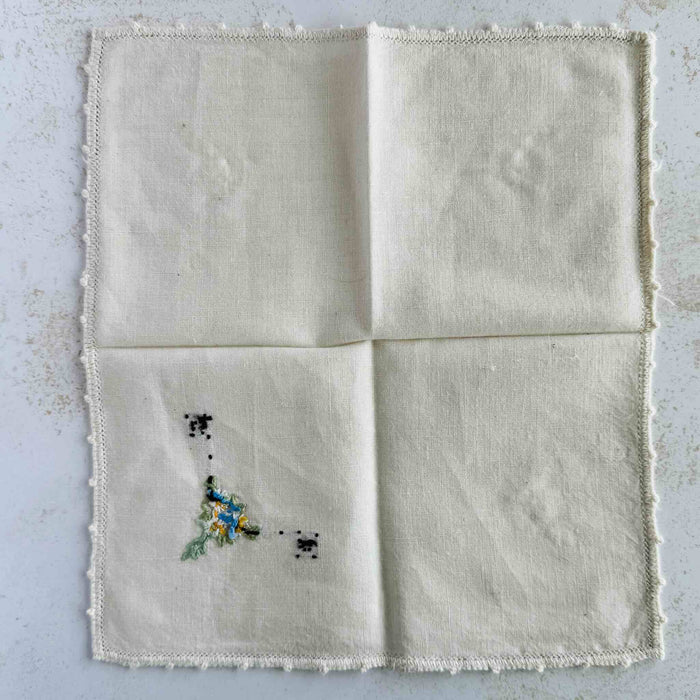Back of unfolded cocktail napkin