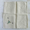Back of unfolded cocktail napkin