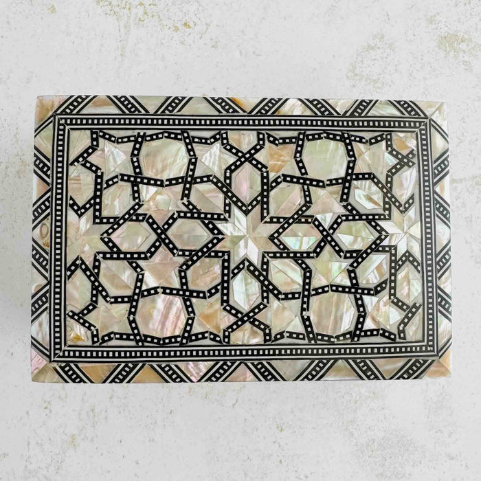 Top of Inlaid wood box showing mother of pearl inlay